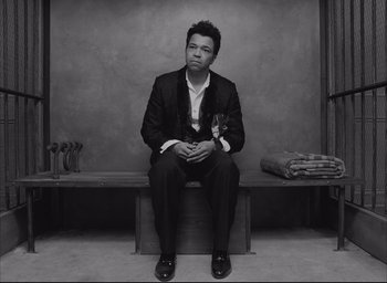 Movie still from “The French Dispatch” (2021), directed by Wes Anderson – Medium shot, Overhead angle