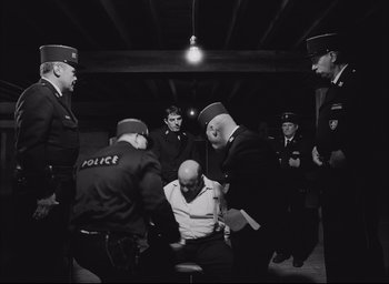 Movie still from “The French Dispatch” (2021), directed by Wes Anderson – Wide shot, High angle