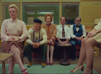 Movie still from “The French Dispatch” (2021), directed by Wes Anderson – Wide shot, Low angle