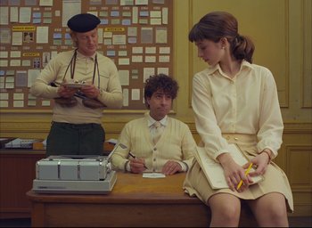 Movie still from “The French Dispatch” (2021), directed by Wes Anderson – Medium shot, Over the shoulder angle