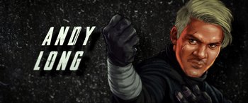 Movie still from “Accident Man: Hitman's Holiday” (2022), directed by George Kirby – A man with a red head is holding his fist up; Extreme Close Up shot, Low angle