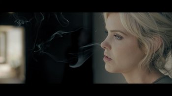Movie still from “Adverse” (2020), directed by Brian A. Metcalf – A woman with a cigarette in her mouth; Close Up shot, Low angle