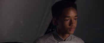 Movie still from “After Earth” (2013), directed by M. Night Shyamalan – A young man is looking into the distance; Close Up shot, Over the shoulder angle