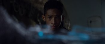 Movie still from “After Earth” (2013), directed by M. Night Shyamalan – A young man is looking into the distance; Close Up shot, Over the shoulder angle