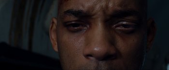 Movie still from “After Earth” (2013), directed by M. Night Shyamalan – A man's face with his eyes closed; Extreme Close Up shot, Overhead angle