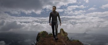 Movie still from “After Earth” (2013), directed by M. Night Shyamalan – A man standing on top of a hill; Wide shot, Low angle