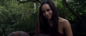 Movie still from “After Earth” (2013), directed by M. Night Shyamalan – A woman with long black hair smiles at the camera; Close Up shot, Over the shoulder angle