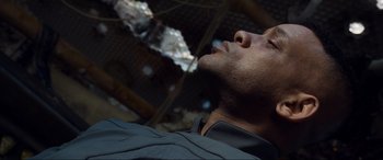 Movie still from “After Earth” (2013), directed by M. Night Shyamalan – A person looking up at the sky; Close Up shot, Overhead angle