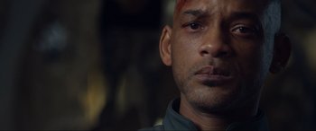 Movie still from “After Earth” (2013), directed by M. Night Shyamalan – Will smith's face with blood all over it; Close Up shot, Low angle