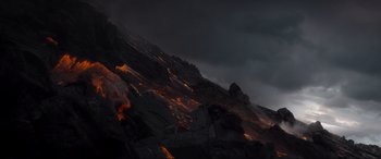 Movie still from “After Earth” (2013), directed by M. Night Shyamalan – A mountain with a lot of lava on top of it; Extreme Wide shot, High angle