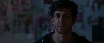 Movie still from “Afterlife of the Party” (2021), directed by Stephen Herek – A person wearing a black shirt; Close Up shot, Over the shoulder angle