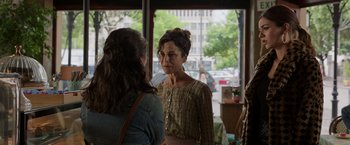 Movie still from “Afterlife of the Party” (2021), directed by Stephen Herek – Two women standing in front of a store window; Medium shot, Over the shoulder angle