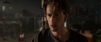 Movie still from “Afterlife of the Party” (2021), directed by Stephen Herek – A person with a beard; Close Up shot, Over the shoulder angle