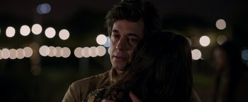 Movie still from “Afterlife of the Party” (2021), directed by Stephen Herek – A person hugging a person; Close Up shot, Over the shoulder angle