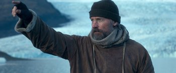 Movie still from “Against the Ice” (2022), directed by Peter Flinth – Medium shot, Low angle