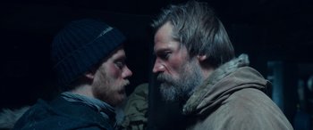 Movie still from “Against the Ice” (2022), directed by Peter Flinth – Close Up shot, Over the shoulder angle