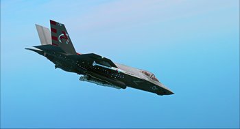 Movie still from “Aircraft Carrier: Guardian of the Seas” (2016), directed by Stephen Low – A fighter jet flying through the air on a clear day; Extreme Wide shot, Overhead angle