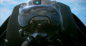 Movie still from “Aircraft Carrier: Guardian of the Seas” (2016), directed by Stephen Low – A view from inside an airplane cockpit of a pilot; Close Up shot, Low angle