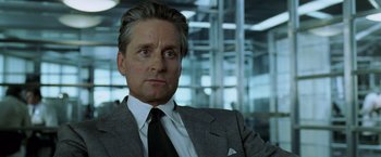 Movie still from “The Game” (1997), directed by David Fincher – A person wearing a suit and tie; Close Up shot, Low angle