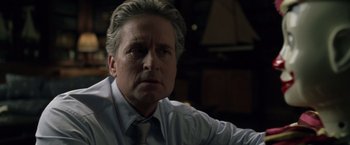 Movie still from “The Game” (1997), directed by David Fincher – A person wearing a shirt and a tie; Close Up shot, Over the shoulder angle