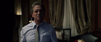 Movie still from “The Game” (1997), directed by David Fincher – A person wearing a shirt and a tie; Close Up shot, Low angle