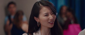 Movie still from “Alex Strangelove” (2018), directed by Craig Johnson – A person with long black hair; Close Up shot, Over the shoulder angle