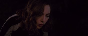 Movie still from “Alex Strangelove” (2018), directed by Craig Johnson – A person with long brown hair; Close Up shot, High angle