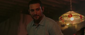 Movie still from “Alice, Darling” (2022), directed by Mary Nighy – A person wearing a shirt; Close Up shot, Over the shoulder angle