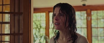 Movie still from “Alice, Darling” (2022), directed by Mary Nighy – A woman with wet hair crying in front of a window; Close Up shot, Over the shoulder angle
