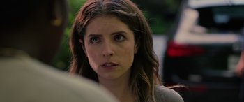 Movie still from “Alice, Darling” (2022), directed by Mary Nighy – A person with long brown hair; Close Up shot, Over the shoulder angle