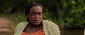 Movie still from “Alice, Darling” (2022), directed by Mary Nighy – A person wearing a jacket; Close Up shot, Over the shoulder angle