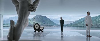 Movie still from “Alien: Covenant” (2017), directed by Ridley Scott – A man standing in front of a mirror in a room; Wide shot, Low angle