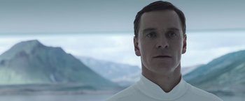 Movie still from “Alien: Covenant” (2017), directed by Ridley Scott – A person wearing a white shirt; Close Up shot, Low angle