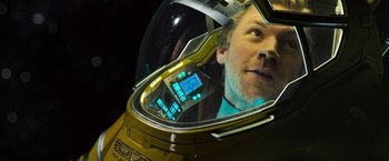 Movie still from “Alien: Covenant” (2017), directed by Ridley Scott – A person in a space helmet; Close Up shot, Overhead angle