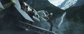 Movie still from “Alien: Covenant” (2017), directed by Ridley Scott – A group of people standing on top of a ramp; Wide shot, Low angle