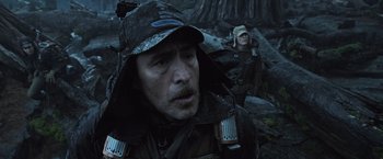 Movie still from “Alien: Covenant” (2017), directed by Ridley Scott – A man and a woman in the woods wearing hats; Close Up shot, Low angle
