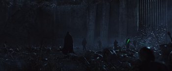 Movie still from “Alien: Covenant” (2017), directed by Ridley Scott – A group of people walking through the woods at night; Extreme Wide shot, Low angle