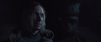 Movie still from “Alien: Covenant” (2017), directed by Ridley Scott – A person with long hair; Close Up shot, Low angle