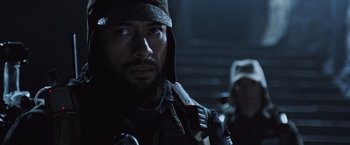 Movie still from “Alien: Covenant” (2017), directed by Ridley Scott – A person wearing a hood; Close Up shot, Over the shoulder angle