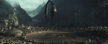Movie still from “Alien: Covenant” (2017), directed by Ridley Scott – An image of an alien ship flying over a city; Extreme Wide shot, High angle