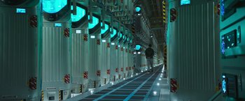 Movie still from “Alien: Covenant” (2017), directed by Ridley Scott – A man is standing in a hallway of a building; Extreme Wide shot, Low angle