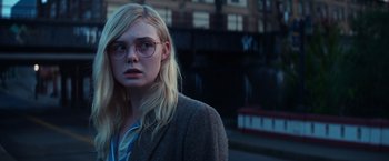 Movie still from “All the Bright Places” (2020), directed by Brett Haley – A young woman wearing glasses and a jacket; Close Up shot, Over the shoulder angle