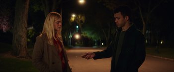 Movie still from “All the Bright Places” (2020), directed by Brett Haley – A man and a woman standing in the street; Medium shot, Low angle