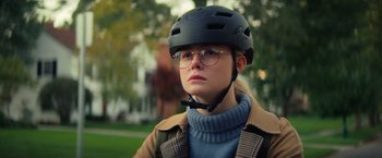 Movie still from “All the Bright Places” (2020), directed by Brett Haley – A person wearing a helmet and glasses on a field; Close Up shot, Low angle