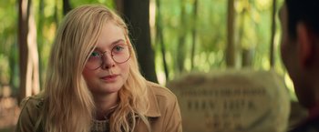 Movie still from “All the Bright Places” (2020), directed by Brett Haley – A woman with glasses and a jacket on; Close Up shot, Over the shoulder angle