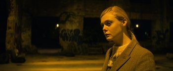 Movie still from “All the Bright Places” (2020), directed by Brett Haley – A young woman is standing in the dark outside; Close Up shot, Low angle
