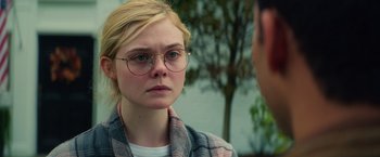 Movie still from “All the Bright Places” (2020), directed by Brett Haley – A woman wearing glasses and a plaid jacket; Close Up shot, Over the shoulder angle