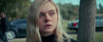 Movie still from “All the Bright Places” (2020), directed by Brett Haley – A person with blonde hair; Close Up shot, Low angle
