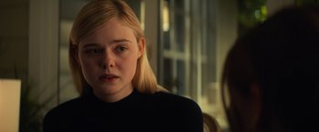 Movie still from “All the Bright Places” (2020), directed by Brett Haley – A woman with long blonde hair sitting in front of a window; Close Up shot, Over the shoulder angle