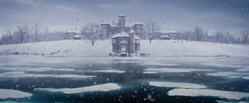 Movie still from “The Great Gatsby” (2013), directed by Baz Luhrmann – A building that is sitting in the middle of the snow; Extreme Wide shot, High angle